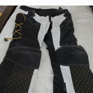 Motorcycle L pants with insertsside leg ventsNWOT